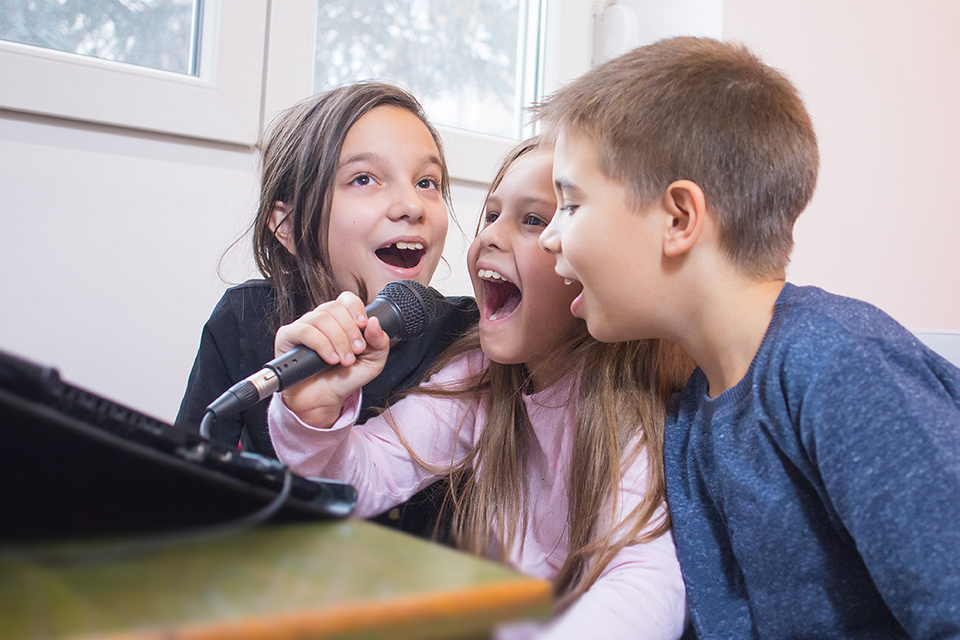 Singing Teacher in Bradford giving children singing lessons