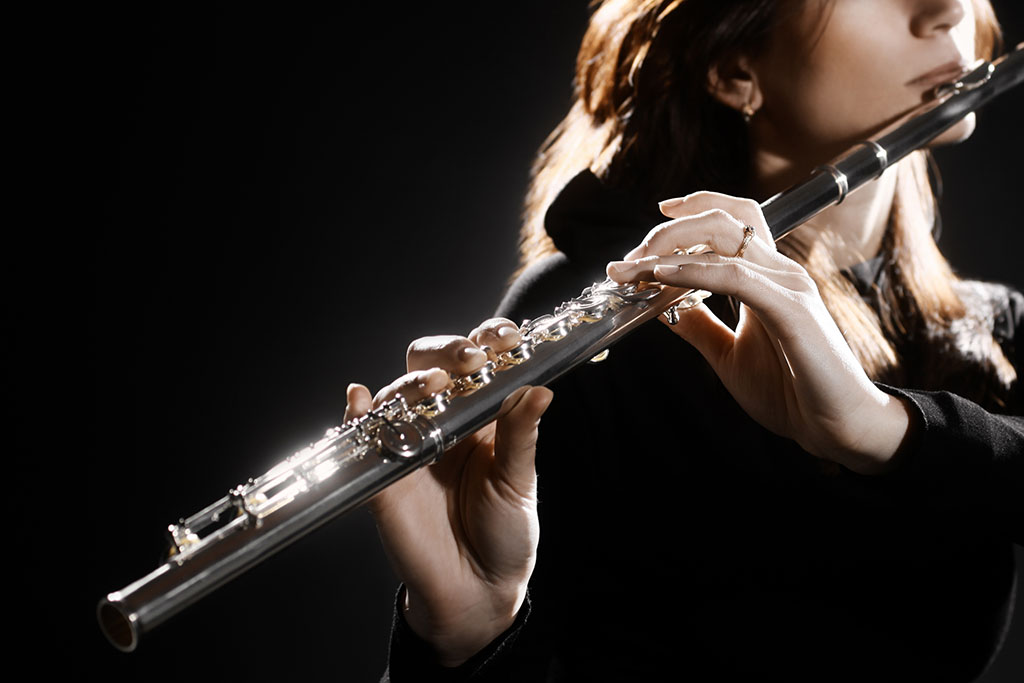 Flautist hands playing flute receiving flute lessons in hebden bridge