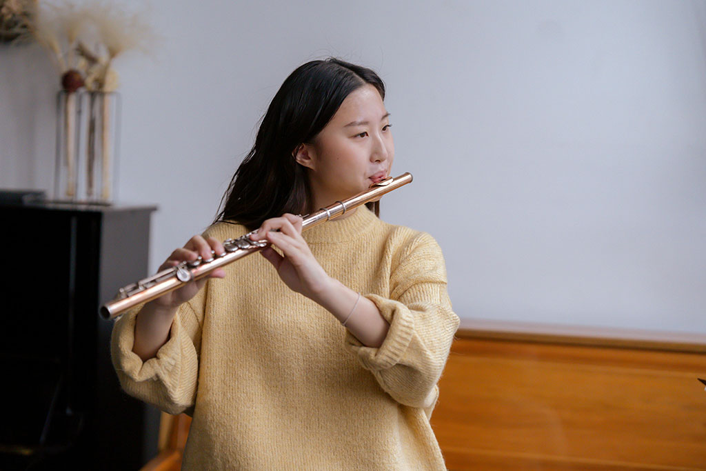 asian lady receiving online flute lessons in barnsley