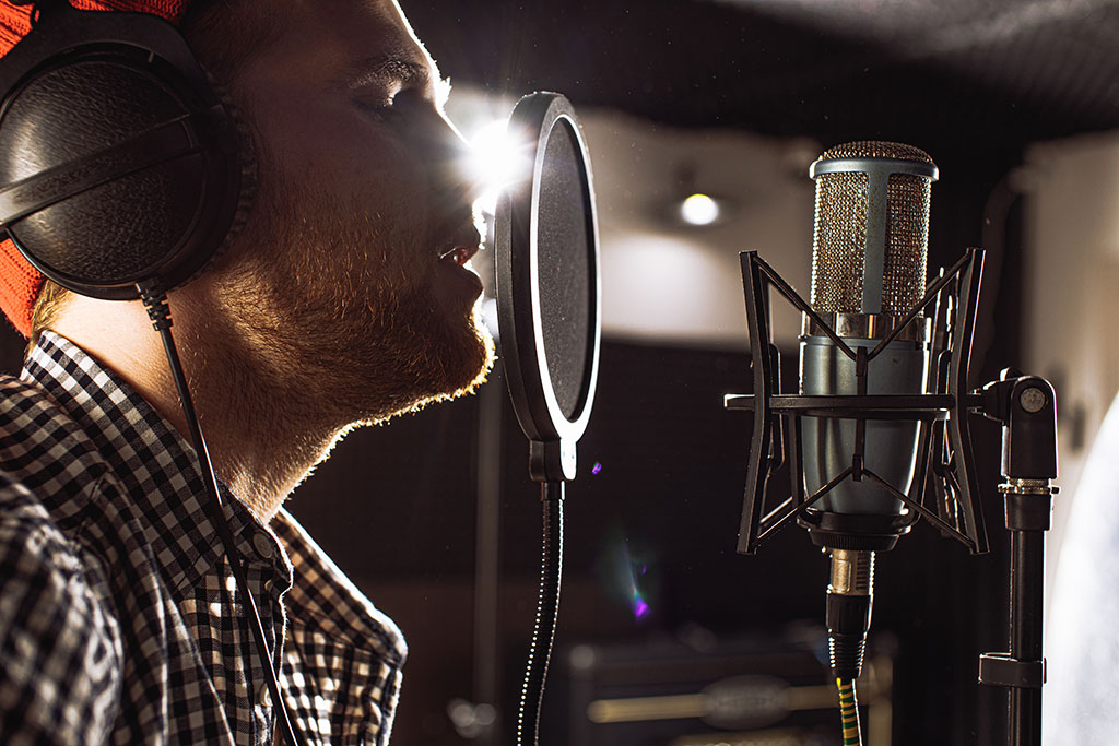 singer man practicing his online singing lessons in Hebden Bridge